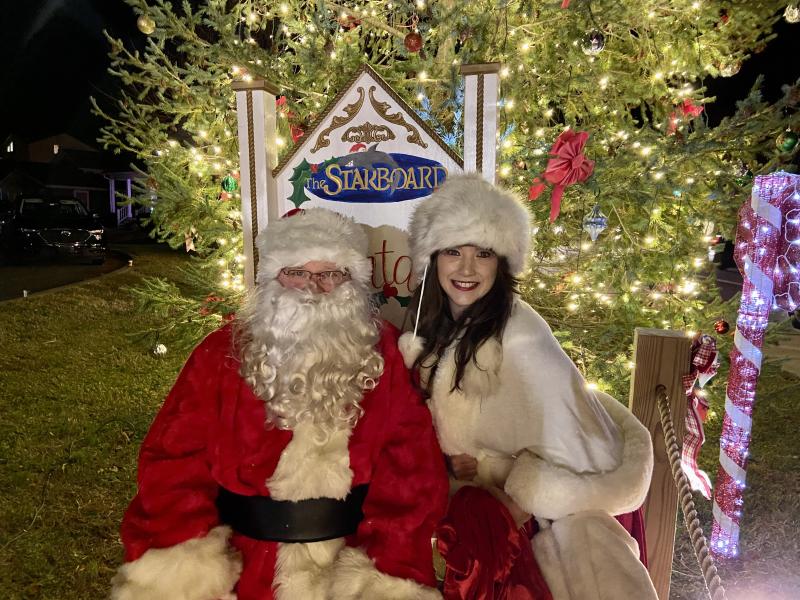 Santa and Mrs. Claus arrived via fire truck to attend the Dewey Business Partnership’s annual tree lighting at Fifer’s Farm Market Nov. 26. ELLEN DRISCOLL PHOTOS